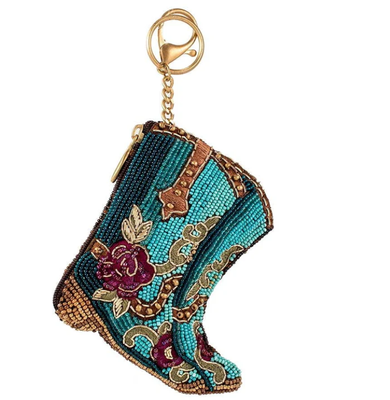 Kickin'Around Coin PurseSoft pink beaded coin bag with glittering gold crown zipper closure easy open trigger hook key ring and credit card fitting compact design. सोने के मुकुट के साथ हल्के गुलाबी मोती बैग को बंद करना आसान है। ट्रिगर हुक कुंजी रिंग और क्रेडिट कार्ड फिट कॉम्पैक्ट डिजाइन