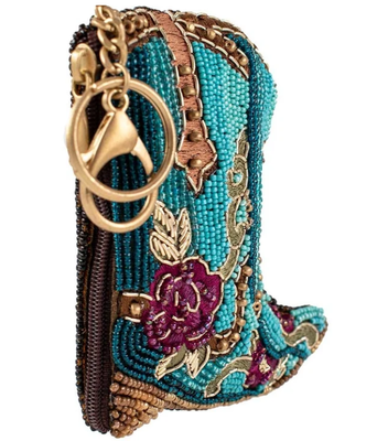 Kickin'Around Coin PurseSoft pink beaded coin bag with glittering gold crown zipper closure easy open trigger hook key ring and credit card fitting compact design. सोने के मुकुट के साथ हल्के गुलाबी मोती बैग को बंद करना आसान है। ट्रिगर हुक कुंजी रिंग और क्रेडिट कार्ड फिट कॉम्पैक्ट डिजाइन